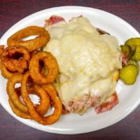 Open Faced Reuben Sandwich · Served over rye with corned beef, sauerkraut, Russian dressing and melted Swiss.