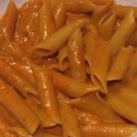 Penne Alla Vodka · Our homemade creamy pink vodka sauce served over penne pasta and sprinkled with grated parme...
