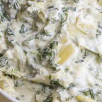 Artichoke And Spinach Dip · Creamy spinach and artichoke dip served with corn tortilla chips.