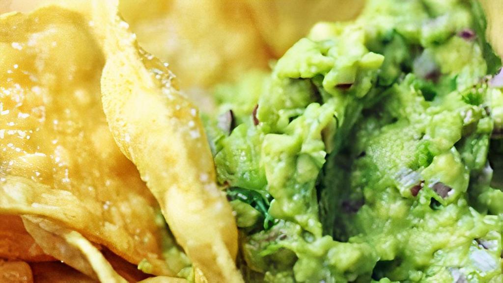 Chips And Guacamole · Housemade guacamole served with corn tortilla chips.