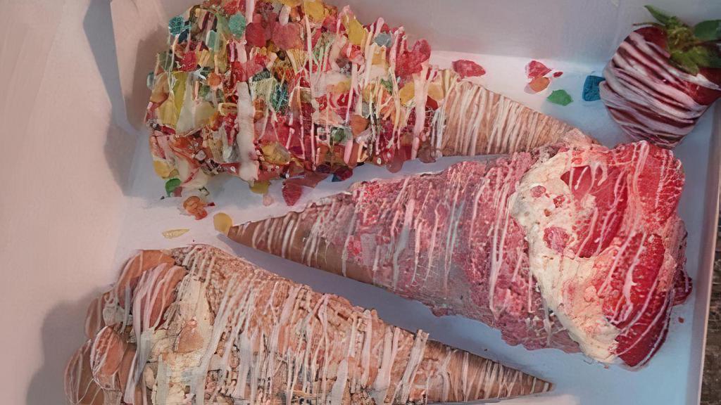  Ann Marie Speciality Cones  · Fruity Pebbles  Cones Cheesecake Filling Dipped in Optional White Or White Chocolate
