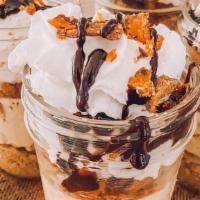 Butterfinger Peanut Butter Cheesecake Jar  · Incredible Flavors Peanut Butter , Cheesecake , Chocolate Butterfingers and whip cream