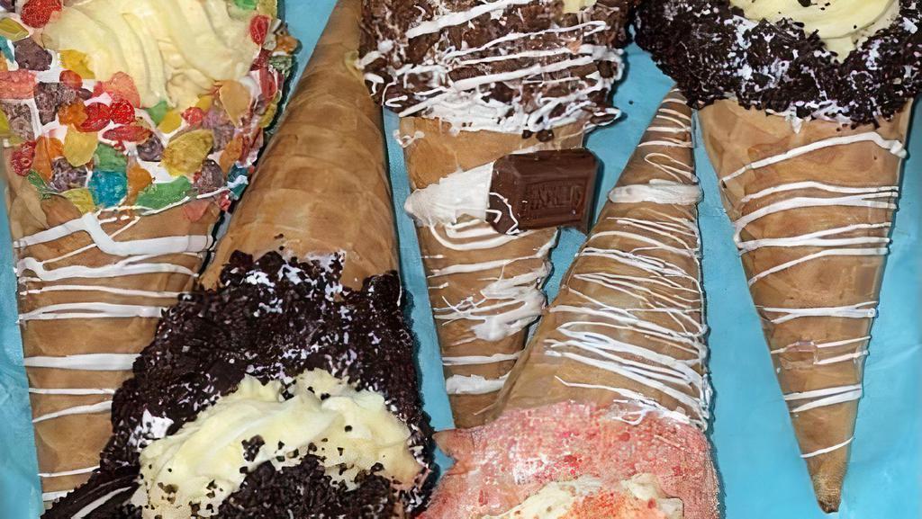 5 Pk  Assorted Flavors  Speciality Cones  · Sampler 5 Pk Assorted Flavors 
1 Fruity Pebbles , 2 Oreo , 1 Hershey , 1 Strawberry Crunch Filled With Creamy Cheesecake 

No Substitute