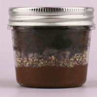 Triple Chocolate Lava  Supreme 8 Oz · : mini cake jar is the ultimate chocolate feast as it features decadent chocolate cake layer...