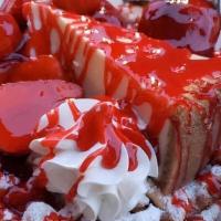 Ann Marie’S Strawberry Shortcake Deluxe Funnel Cake  · Freshly Made Funnel Cake Homemade Strawberry Glaze Fresh Strawberry Topping & Fresh Cheeseca...