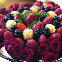 Sympathy Arrangement · Ingredients:

* Roses

* Strawberries

* Blackberries 

* Ferrero Rocher                    ...