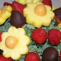 Sweet & Delicious Arrangement  · Pineapple & cantaloupe , fresh strawberries & Chocolate dipped 

Flavors 
Salted Caramel 
Va...