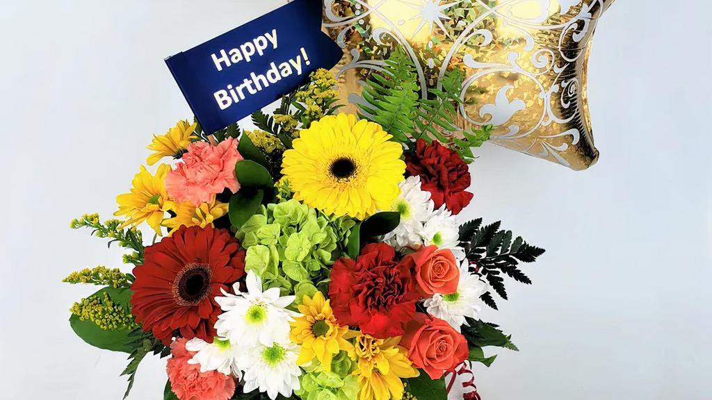 Happy Birthday Festival Fun · Ballon & Flower Arrangements 

Send a Happy Birthday gift with a shiny balloon and birthday flag with bright yellow, red and orange mixed flowers in a keepsake red vase. 

This design is the perfect present.