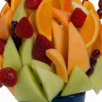 Simple Edible Bouquet 
 · Melons , cantaloupe , oranges , strawberries v, grapes