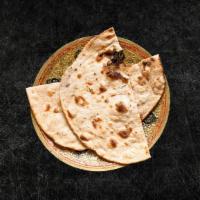 Tandoori Roti (Vegan) · Whole wheat flat bread baked to perfection in an Indian clay oven