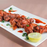 Chipotle Chicken Wings · Fresh bone in chicken wings doused in chipotle sauce.