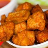 Sweet N Spicy Chicken Tenders · Hand-breaded, golden-fried chicken tenders doused in sweet n spicy sauce.