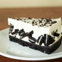 Oreo Cheesecake · A rich and creamy New York-style cheesecake baked with oreos inside a  honey-graham crust.