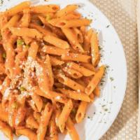 Penne Vodka · Pink sauce with vodka and spice.