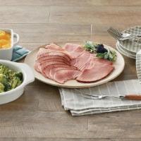 1 Lb Ham By-The-Slice Supper W/Take & Bake Cheesy Potatoes Au Gratin, Green Bean Casserole & Rolls  · Serve our By-The-Slice Supper any night of the week! This meal features:. -1 lb of Bone-in H...