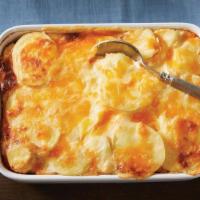 Cheesy Potatoes Au Gratin · Yum - a big family favorite that takes no time at all! Our special recipe takes generous sli...