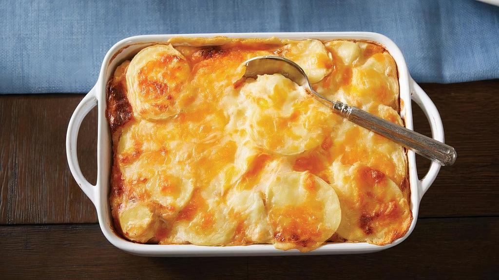 Cheesy Potatoes Au Gratin · Yum - a big family favorite that takes no time at all! Our special recipe takes generous slices of select gold potatoes, then smothers them in a rich, creamy blend of cheddar cheeses. All you do is bake to perfection. Side arrives frozen. Just Heat and Serve.