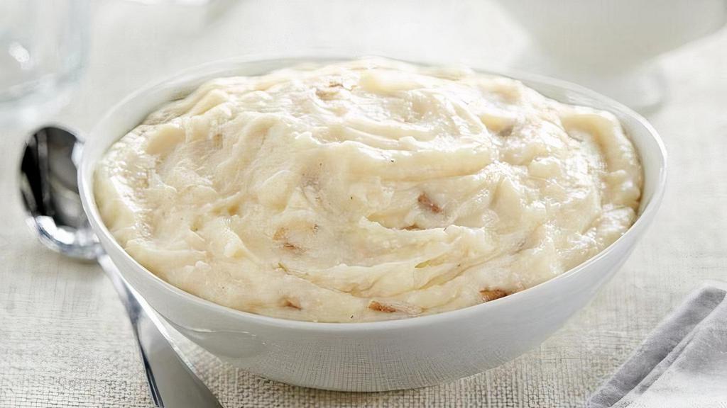 Creamy Russet Mashed Potatoes · Who can say no to a family favorite that takes no time at all! A perfect blend of butter and russet potatoes makes this dish a hit at any dinner party. Rich and creamy; all you do is bake to perfection. No one will know you didn't make this side dish from scratch! Side arrives frozen. Just Heat and Serve.