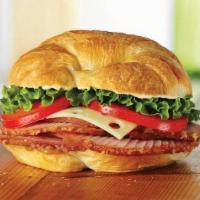 Ham Classic · Honey Baked ham topped with swiss cheese, lettuce, tomato, Dukes Mayonnaise, and Hickory Hon...