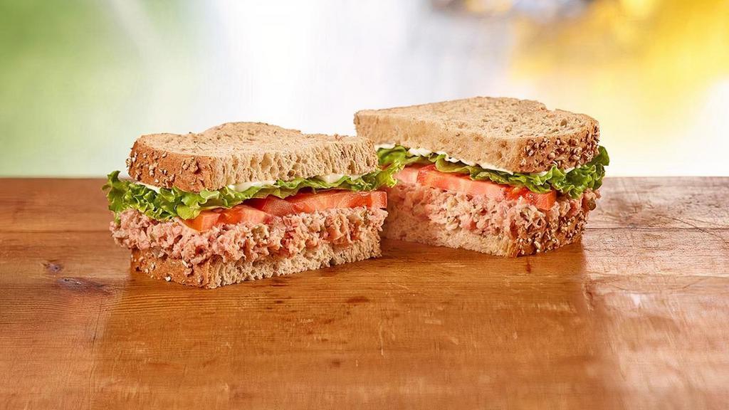 Ham Salad · Honey Baked Ham Salad topped with lettuce, tomato, and Duke’s® mayonnaise on multigrain bread. 720 cal.