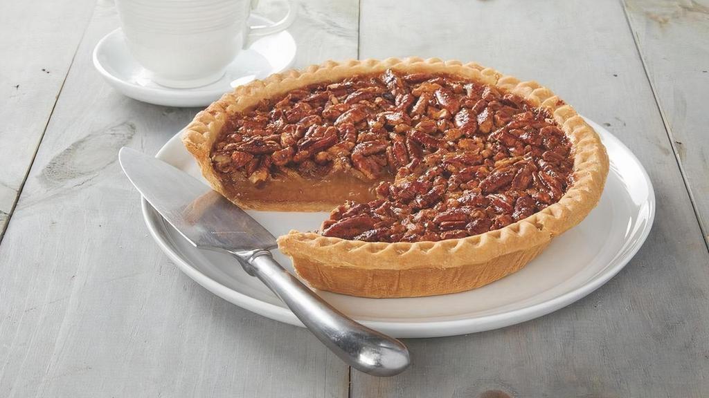 Southern Pecan Pie · Serve your guests a slice of down-home comfort to top off the perfect meal. Like all of our products, our Southern Pecan Pie is made from the finest ingredients for flavor beyond compare. The crisp, flaky crust is filled with brown sugar, warm spices and syrup, whole eggs and chopped pecans. The pie is hand-topped with roasted pecan halves for a deep, buttery flavor certain to satisfy your sweet tooth. Serves 8