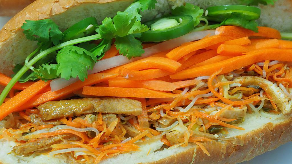 Vegetarian · Tofu, cabbage, carrots, dried daikon, roasted rice, mayonnaise, cucumber, parsley, pickle carrots & daikon.