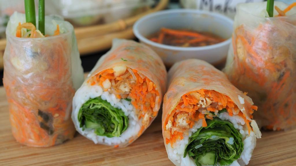 Vegetarian Roll · Rice paper, vermicelli noodles, tofu, cabbage, carrots, dried daikon, roasted rice, basil, mint, cucumber, lettuce.