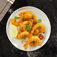 Fried Shrimp · Fresh shrimp battered and fried until golden brown.  (10 pieces)