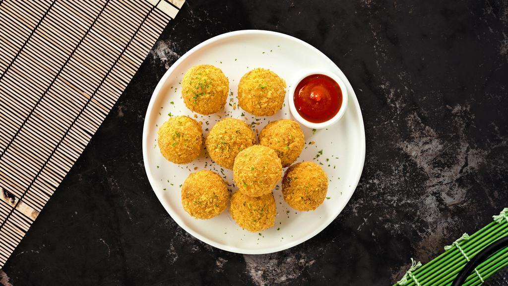 Mac & Cheese Balls · (Vegetarian) Bite-size clumps of mac and cheese breaded and fried until golden brown. (10 pieces).