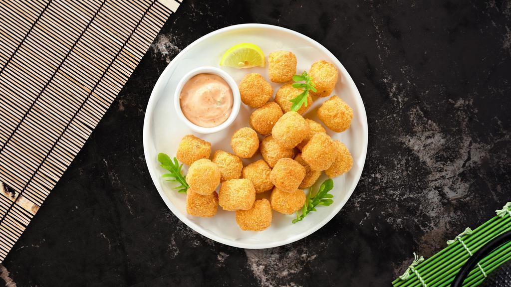 Tater Tots · (Vegetarian) Shredded Idaho potatoes formed into tots, battered, and fried until golden brown.