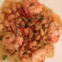 Sautéed Shrimp · Over cannellini beans.