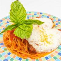 Chicken Parmigianino · Over linguini and tomato sauce.