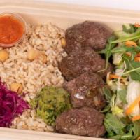 Organic Meatballs Plate · Includes brown rice and chickpea, green hummus, veggies, greens and homemade hot sauce. Glut...