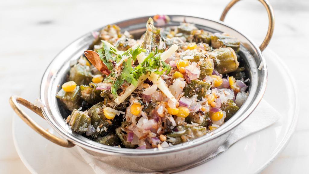 Vendakai Poriyal · Chopped okra, moong dahl, coconut, curry leaves, spices and chili.