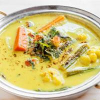 Avial · Mixed vegetables in a traditional South Indian coconut milk curry.