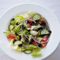 House Salad · Spring mix lettuce, heirloom tomatoes, shallots, shaved grana padano topped with homemade ba...