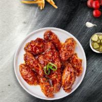 Ktown Wings · Our famous wings fried until perfectly golden and tossed in soy sauce, brown sugar, honey, a...