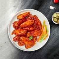 Blazing Buffalo Wings · Our famous wings fried until perfectly golden and tossed in mild or hot buffalo sauce. Serve...
