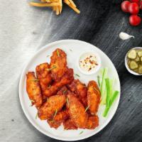 Plain Jane Wings · Our famous wings fried until perfectly golden served plain. Served with your choice of sauce...