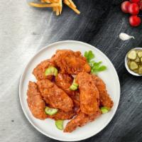 Native Nashville Wings · Our famous wings fried until perfectly golden and tossed in Nashville Hot Sauce. Served with...