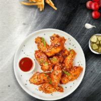 S&S Combination Wings · Our famous wings fried until perfectly golden and tossed in sweet and sour sauce. Served wit...