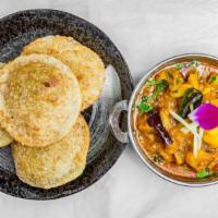 Aaloo Poori (5 Pieces) · Lentil filled deep fried poori (flat bread) and a creamy potato curry that melts in your mou...