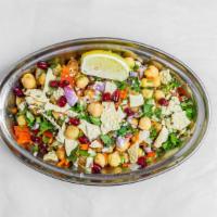 Chana Chaat · Well seasoned boiled chickpeas chaat tossed with onion, cucumber, carrots and bell peppers w...