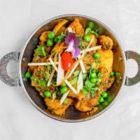 Aloo Matar Sookha · Cumin spiced dry potato and pea stir fry with ginger, asafetida and turmeric, to be eaten in...