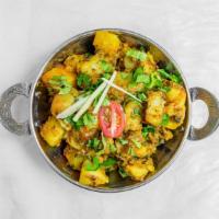 Jeera Aloo · Cumin spiced potatoes tossed with coriander powder, turmeric, ginger, asafetida and a hint o...