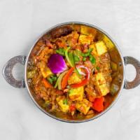 Karahi Paneer · Paneer and Bell Pepper tossed in an onion and tomato sauce with house special  Karahi Masala...