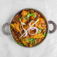   Chicken Curry · A full bodied aromatic curry with bone-in chicken and potatoes slow cooked in onion, tomato,...