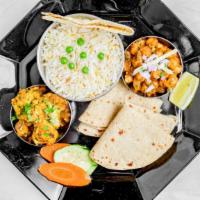 Indian Thaali · A COMPLETE COMBO MEAL of Dal and Vegetable with Roti, Rice and a dessert. All items packed s...