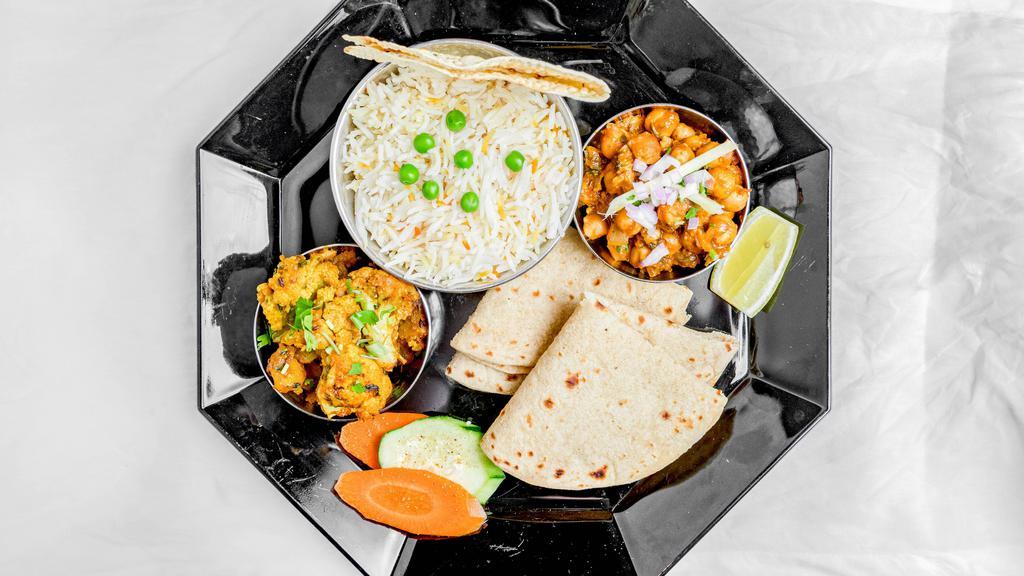 Indian Thaali · A COMPLETE COMBO MEAL of Dal and Vegetable with Roti, Rice and a dessert. All items packed separately. Individual dishes vary weekly but will be from our menu.
VEGETARIAN ONLY