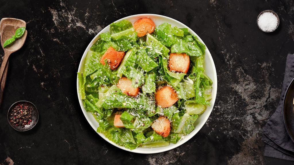 The Great Caesar Salad · Romaine lettuce, croutons, and a touch of parmigiana cheese.